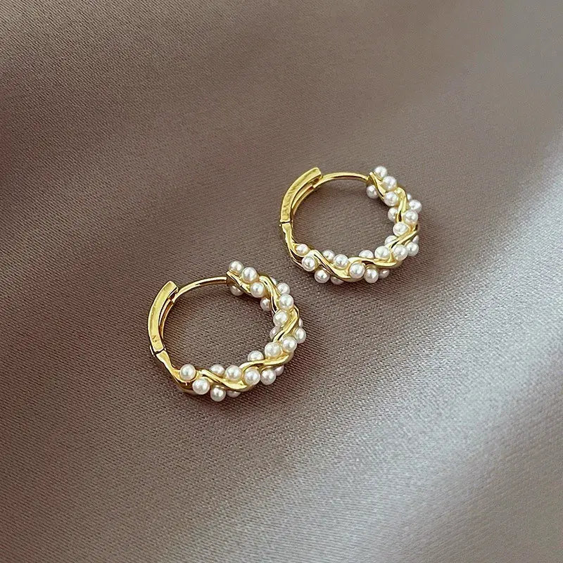 Elegant round pearl earrings with inlays Unique Joyas